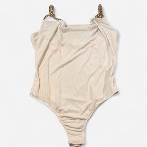 Elegant White Bodysuit with Gold Chain Straps